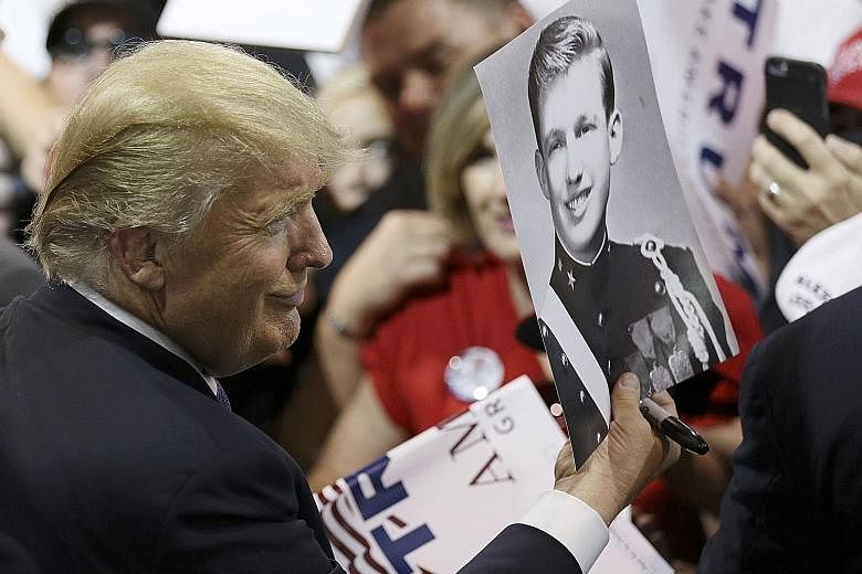 Mr Trump greeting the crowd at a campaign rally in Houston, Texas, last Friday. Political website Politico noted that the intensity of the antipathy towards Mr Trump and the lack of enthusiasm for him was unprecedented. Last week began on a sour note
