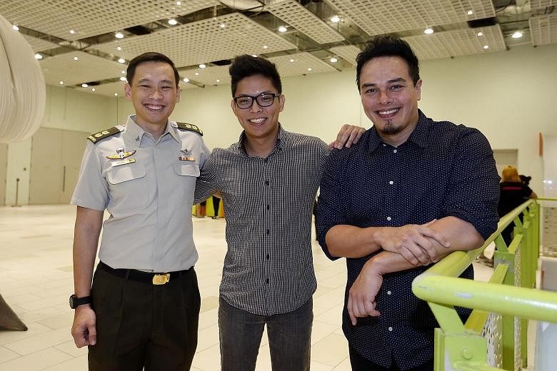 The team behind the new theme song include (from left) NDP multimedia committee chairman Lt-Col Lim, music video producer Mr Huang and composer Mr Richmond, who said he got his inspiration for the song while in the shower.