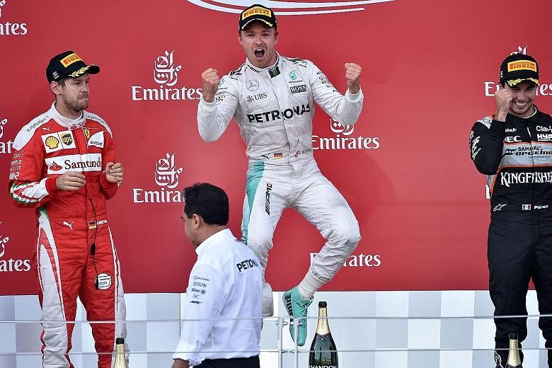 Mercedes driver Nico Rosberg celebrating his win at the inaugural European Grand Prix in Azerbaijan. The German halted a three-race rut to record his fifth win and extend his championship lead by 24 points.