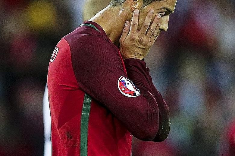 Cristiano Ronaldo could not cap breaking Luis Figo's appearance record for Portugal with a goal against Austria, fluffing his lines from 12 yards as his side could only draw 0-0.