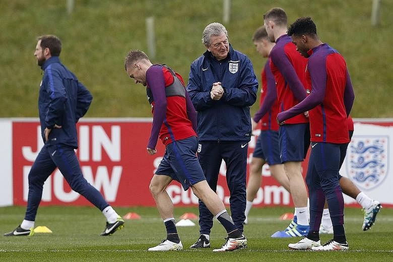 Former England striker Alan Shearer has called on manager Roy Hodgson (centre) to select Jamie Vardy (left) and Daniel Sturridge to replace the jaded Harry Kane and lead England's attack from the start against Slovakia, after the pair of substitutes'