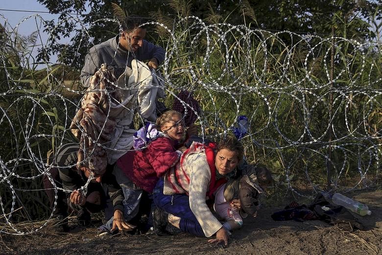Syrian migrants entering Hungary at the border with Serbia last year. After Balkan countries closed their borders, Turkey and the EU struck a deal to stem an influx that had brought a million refugees and migrants to Europe.