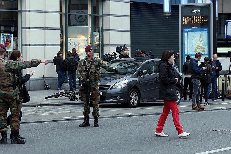 Belgian forces were deployed and tight security checks carried out in Brussels yesterday after police received a phone call from a man claiming he had been abducted and forced to wear an explosives belt. It turned out to be a fake bomb belt containin