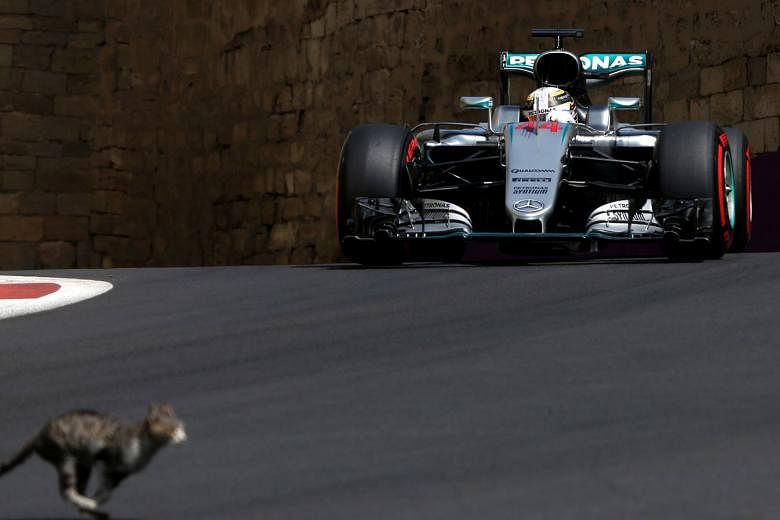 Lewis Hamilton, seen here in action during the third practice session in Baku, cut a frustrated figure during the race as he was unable to sort out his computer issues. 