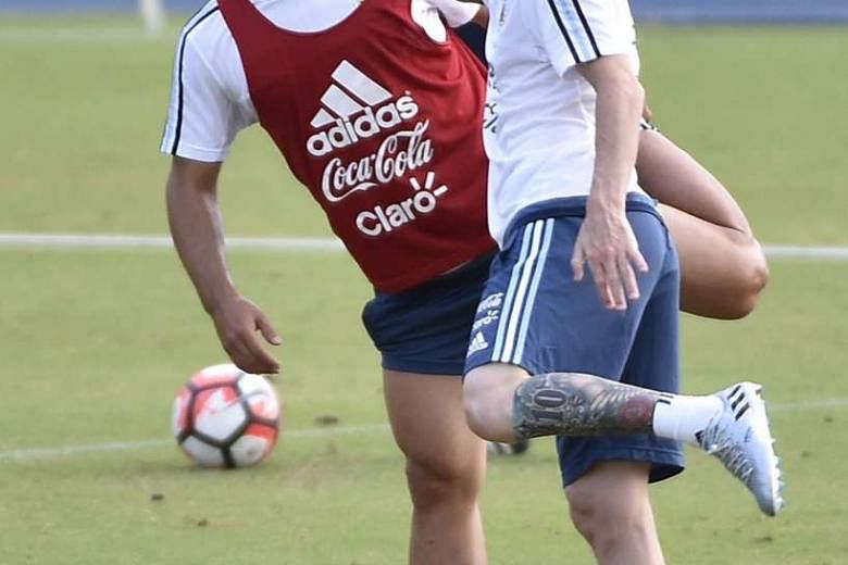 Sergio Aguero (left) and Lionel Messi of Argentina are part of the considerable artillery coach Gerardo Martino can call upon when they face the United States in their Copa America semi-final. 