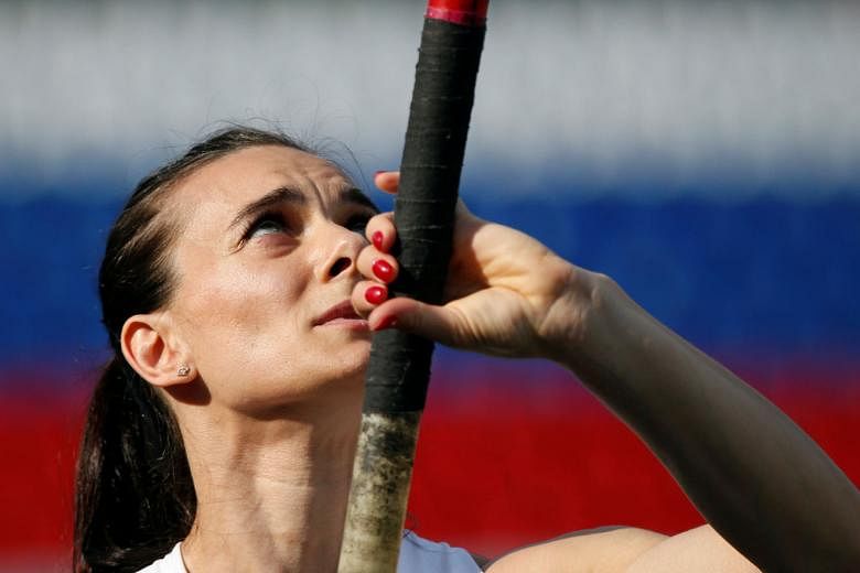 Russian pole vault legend Yelena Isinbayeva, 34, warming up during the ongoing Russian track and field championships in Cheboksary. She said she would sue the IAAF for "a breach of human rights" for barring her from the Olympics, and that the ban was part