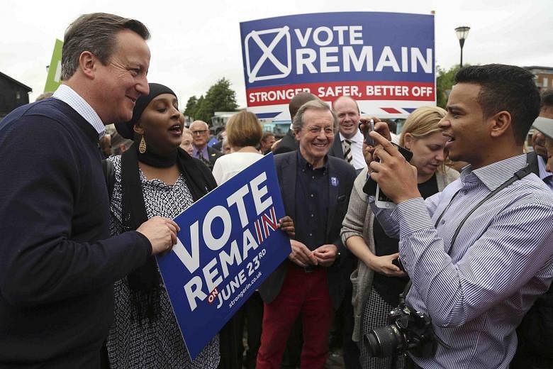 British PM David Cameron (far left) meeting Vote Remain supporters at a rally in Bristol yesterday.
