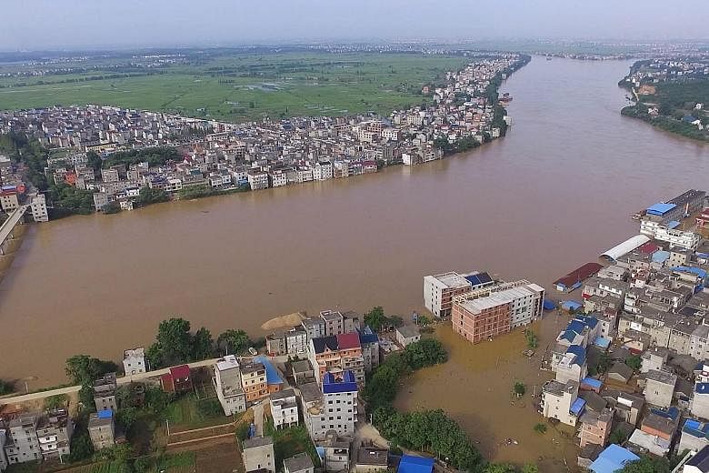 A flooded town in China's Jiangxi province after a river dyke broke on Tuesday.