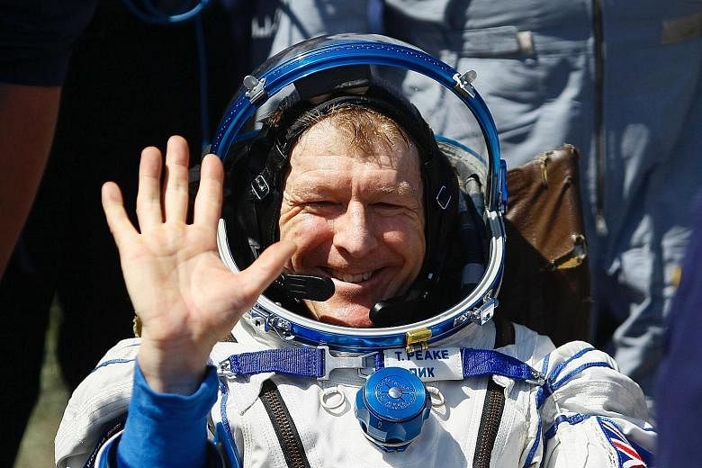 Major Tim Peake after landing in Kazakhstan. He spent six months on the International Space Station, where relieving oneself involves using suction hoses to separate waste from the body.