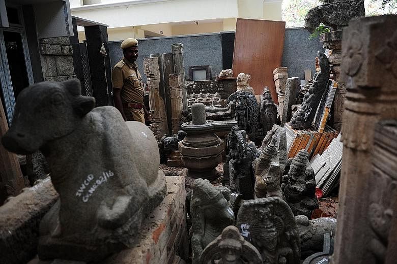 Antique idols and artefacts, believed to be stolen, recovered from art dealer G. Deenadhayalan's home in Chennai. He is suspected of being the leader of a smuggling racket.