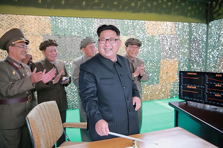 Mr Kim says that the missile test shows North Korea has "the sure capability to attack... the Americans in the Pacific operation theatre".