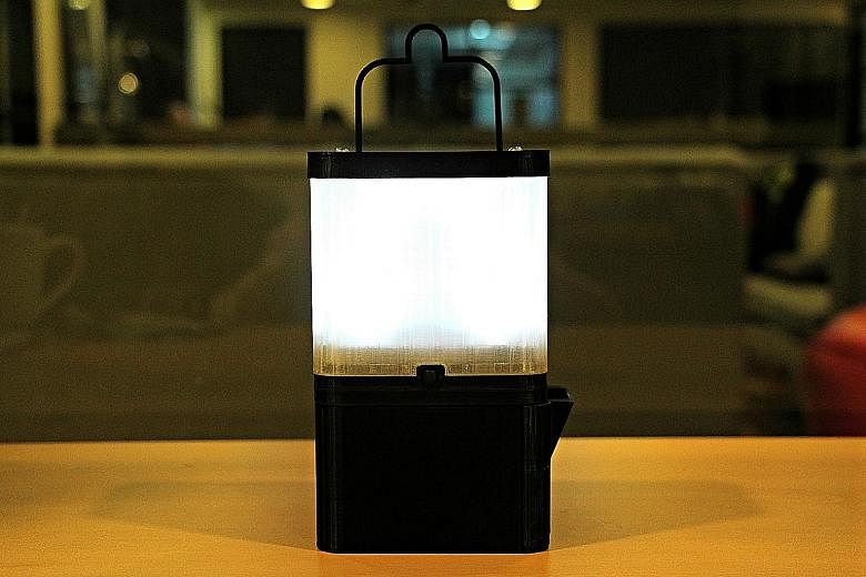 Above: The SALt lamp uses a mixture of salt and water to energise a light-emitting diode. It also has a USB port for charging gadgets. Right: SALt seeks to provide a sustainable alternative source of lighting to communities that rely on kerosene lamp