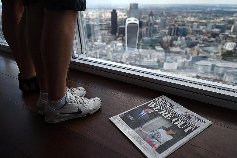 A view of the City of London from the Shard. As news of Brexit came in, major markets in Asia tumbled. Among them, Japan's Nikkei plummeted 7.92 per cent, its worst rout since March 2011. Japanese bank and security firm representatives at a Japanese 