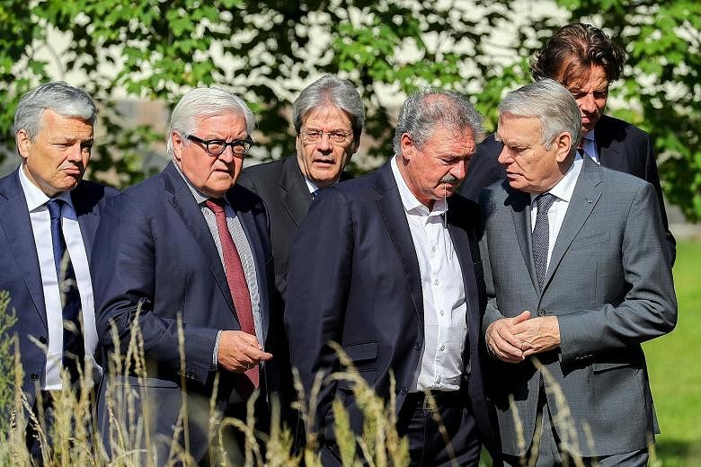 Foreign ministers of the six original states of the European Union - (from left) Belgium's Didier Reynders, Germany's Frank-Walter Steinmeier, Italy's Paolo Gentiloni, Luxembourg's Jean Asselborn, France's Jean-Marc Ayrault and the Netherlands' Bert 