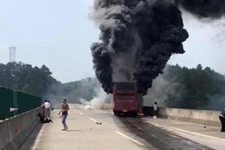 A total of 55 people were on board the bus that burst into flames after crashing in Hunan province. The driver has been detained.