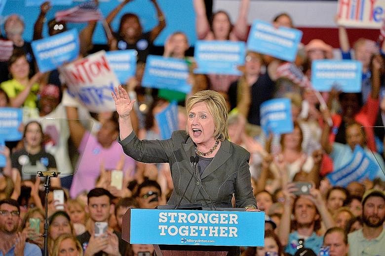 Mrs Clinton at a campaign event in North Carolina. "Stronger together" was also a slogan used by Remain supporters in the Brexit referendum.