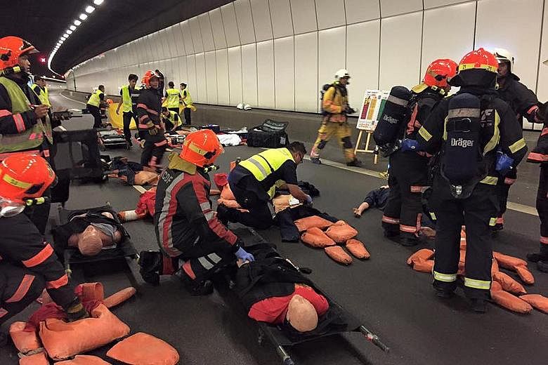 Paramedics and medical personnel rushed to the aid of "casualties" of a traffic accident on the Kallang-Paya Lebar Expressway (KPE) in the wee hours of yesterday morning in a simulated scenario that tested their emergency response skills. The 90-minu