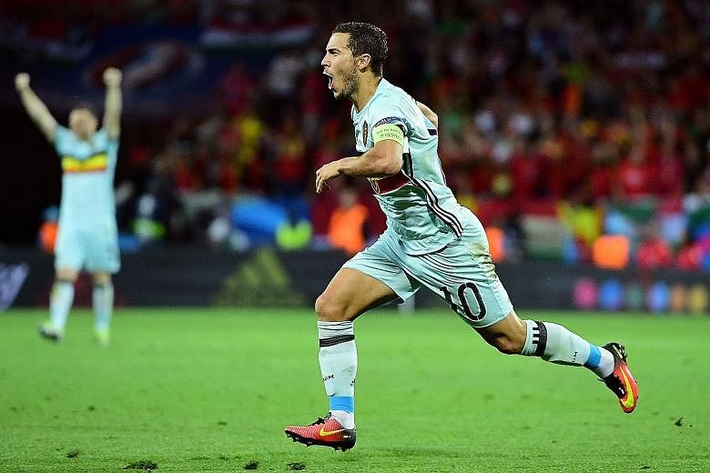 Belgium's Eden Hazard celebrating after scoring the third goal in his team's 4-0 win against Hungary in Toulouse on Sunday.