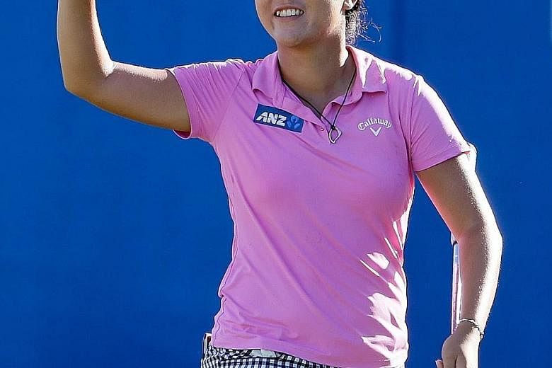 Lydia Ko of New Zealand wearing an Arkansas Razorbacks hat in the shape of its trademark hog. The 19-year-old has now recorded her third victory of the year.
