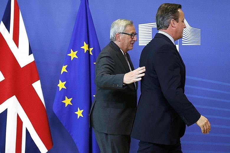 Hello and goodbye. British PM David Cameron (right) and EU Commission president Jean-Claude Juncker arriving at the EU Summit in Brussels yesterday. The summit comes amid anger among European leaders over Mr Cameron's decision to call the Brexit refe
