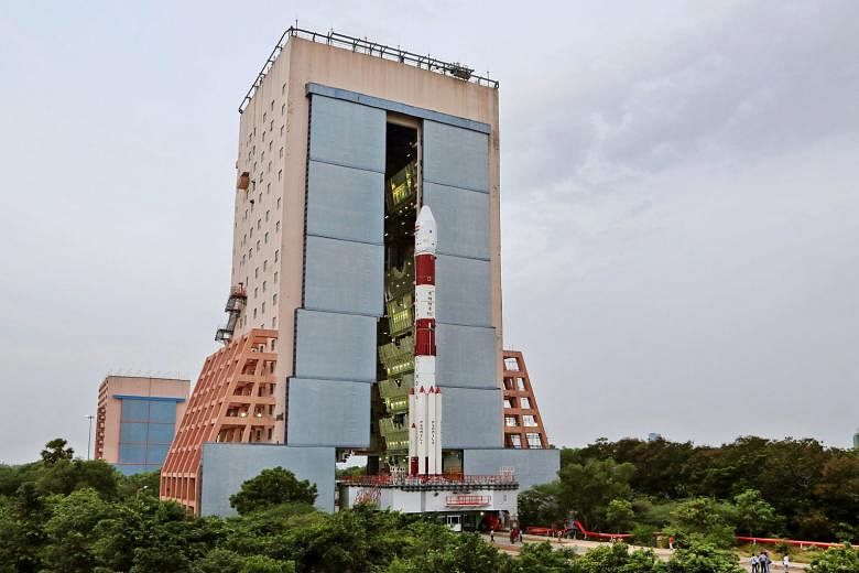 The PSLV-C34, with all its 20 satellites, being moved out of the vehicle assembly building to the second launch pad at the Satish Dhawan Space Centre in Sriharikota, in Andhra Pradesh, last Wednesday. The launch vehicle built by India made world headlines