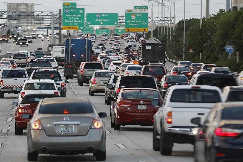 Rush-hour traffic in Miami, Florida. The US imported almost 10 times as much of petrol components like additives, including alkylates, from Singapore last year against a year earlier.