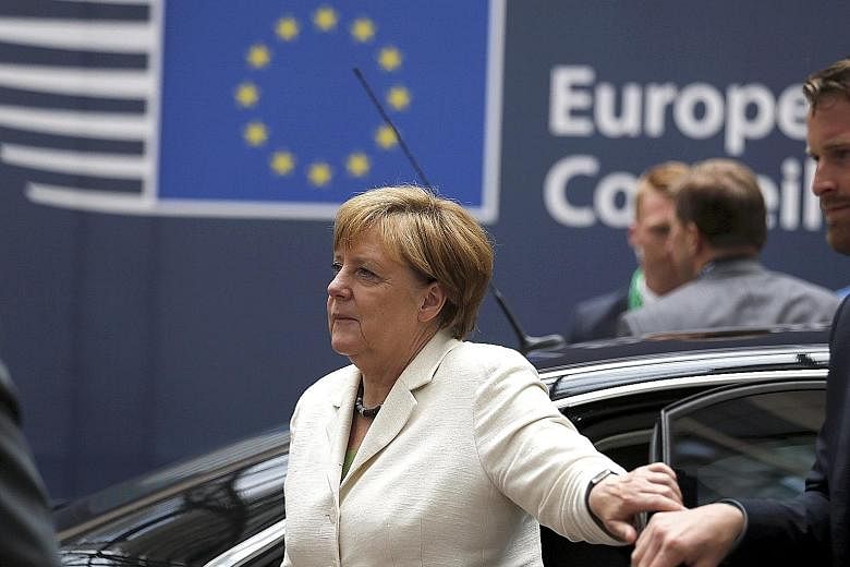 British Prime Minister David Cameron suggests that his successor could begin negotiations with the European Union about Britain's exit before the formal "Article 50" legal process is triggered, despite comments from the EU to the contrary. German Cha
