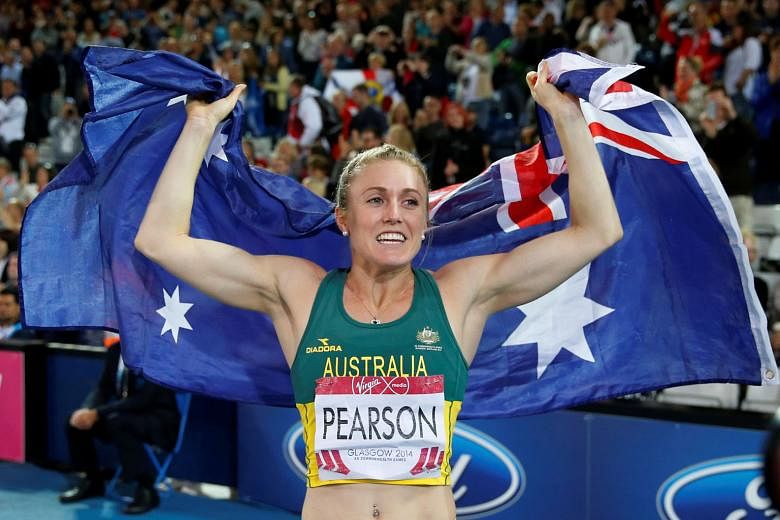 Australian hurdler Sally Pearson, seen here celebrating winning gold in the 100m hurdles at the 2014 Commonwealth Games in Glasgow, has been ruled out of August's Olympics in Brazil after a hamstring injury. 