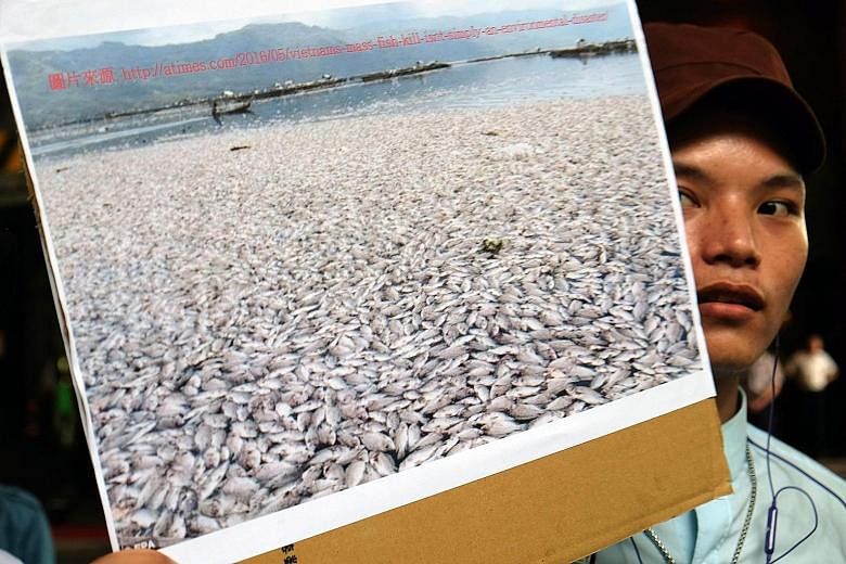 A Vietnamese man taking part in a demonstration in Taipei earlier this month. Protesters blamed the mass fish deaths in Vietnam on Formosa, a Taiwanese conglomerate that is building a multibillion- dollar steel plant in the area where the fish died.
