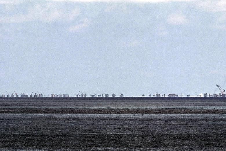 China appears to be continuing with its land reclamation works in the disputed Spratly Islands as seen in this file photo. The July 12 ruling will bring to a close Manila's 2013 case that challenges China's claims to nearly all of the South China Sea