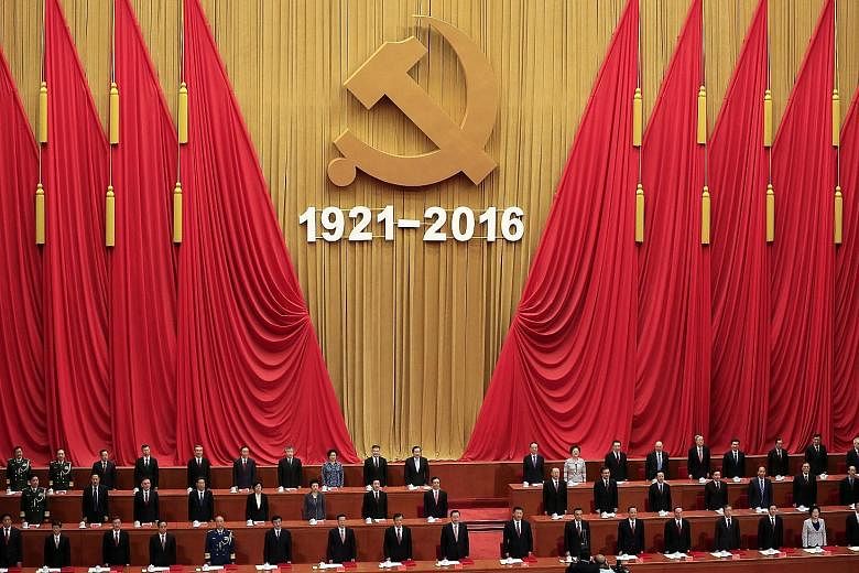 Chinese leaders at the Great Hall of the People marking the 95th anniversary of the Chinese Communist Party yesterday. President Xi singled out corruption as the biggest threat to the party.