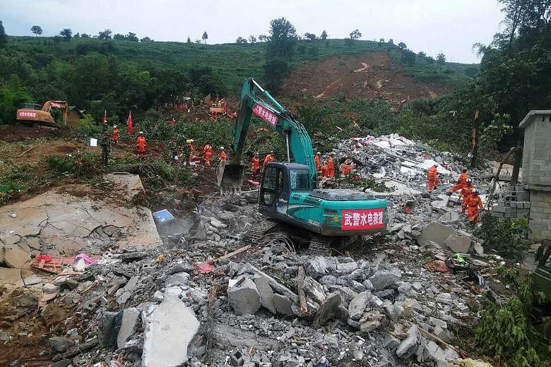 More than 40 people have been killed in landslides in south-west China and northern India. Officials said 20 people were killed after a huge landslide (left) swept through a village in China's Guizhou province last Friday. The National Meteorological