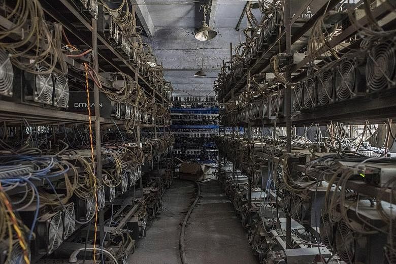 Bitcoin mining machines line the shelves at a server farm in Guizhou, China. Through canny investments and vast farms of computer servers dispersed around the country, a handful of Chinese companies have effectively assumed majority control of the bi