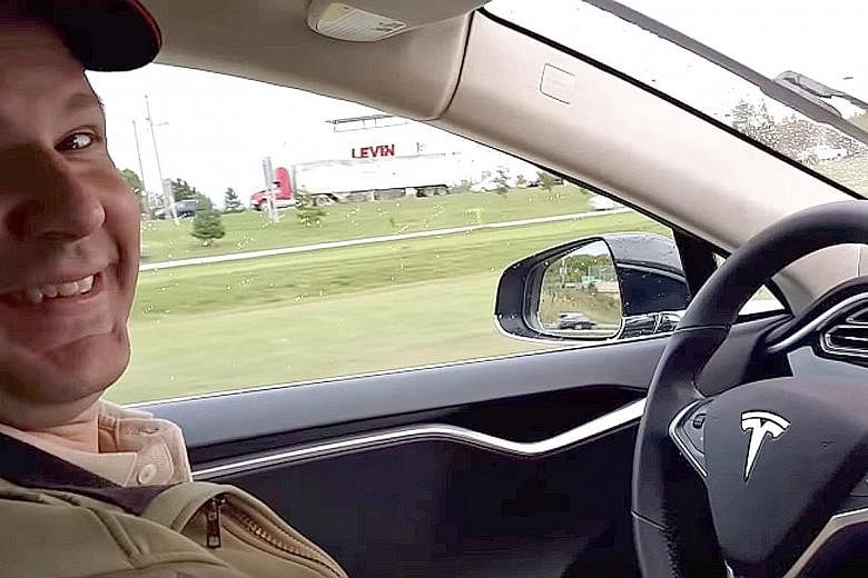 A screengrab of a video posted on YouTube by Mr Joshua Brown himself of a previous trip, celebrating the Autopilot feature of his all-electric Tesla Model S, which allowed him to drive hands-free. He was killed when his sedan collided with a tractor-