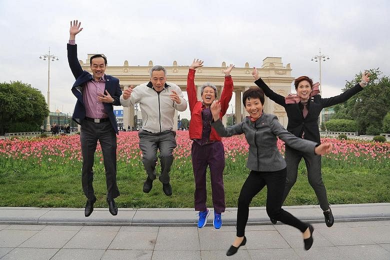 From left: Dr Koh, PM Lee, Mrs Lee, Ms Fu and Mrs Teo in the jump shot taken in Moscow in May. PM Lee posted it on his Facebook page yesterday to mark Youth Day.