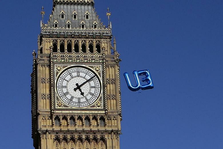 A "EU" balloon floating near the Big Ben clock tower in London's Parliament Square during last weekend's March for Europe demonstration against Britain's decision to leave the European Union. The decision by the EU's second-largest economy to leave t