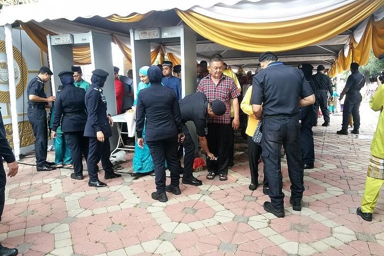 Guests at Prime Minister Najib Razak's annual Aidilfitri open house yesterday morning had to undergo two security checks as they entered the Seri Perdana compound. Since ISIS first issued threats against Malaysia's leaders and high-ranking officials 