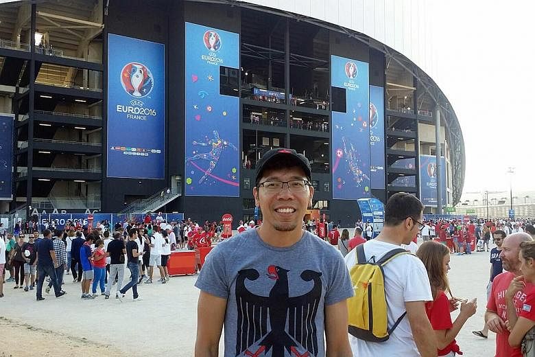 Tang Wanbao outside the 80,000-capacity Stade de France in Paris last Sunday, when hosts France beat Iceland 5-2 to reach the semi-finals.