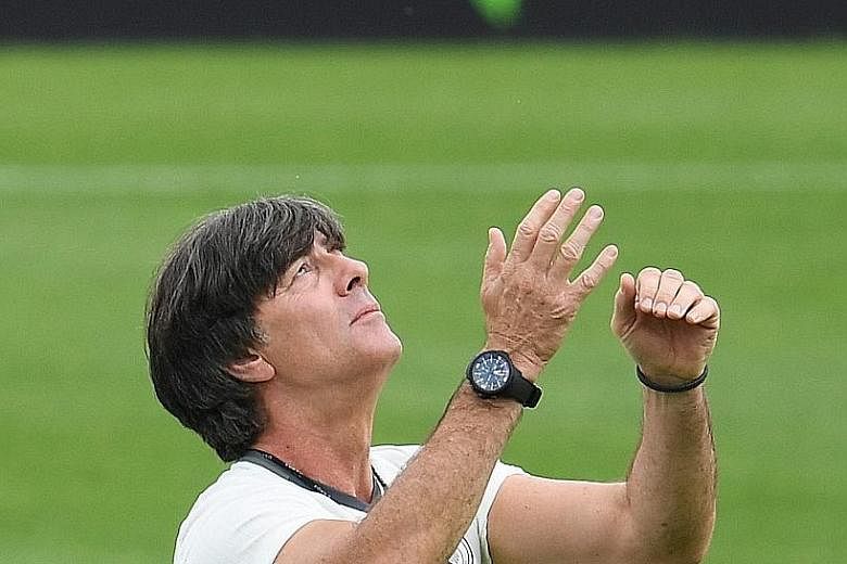 Germany coach Joachim Low, during a training session at his team's camp in Evian, has high hopes for his team. The Germans, three-time champions in this competition, face hosts France in the semi-finals today.