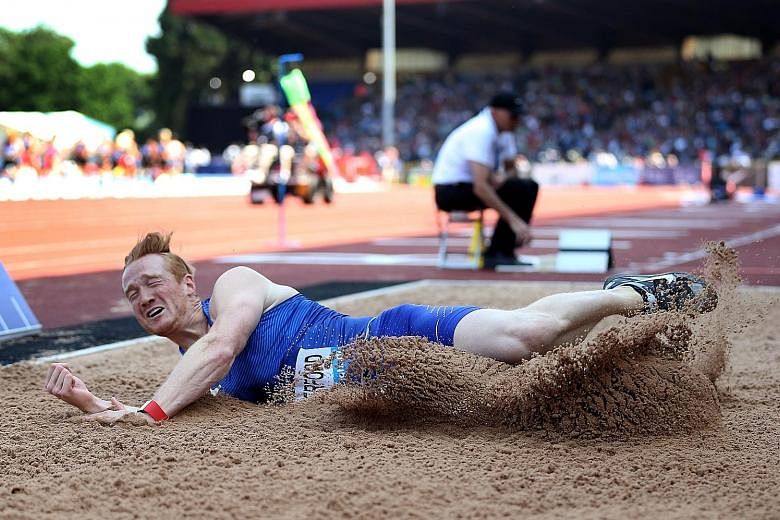 Greg Rutherford in action during the long jump at the Birmingham Diamond League meet last month. He suffered a whiplash injury that caused a severe inner-ear condition, and would have taken time off if not for this being an Olympic year.
