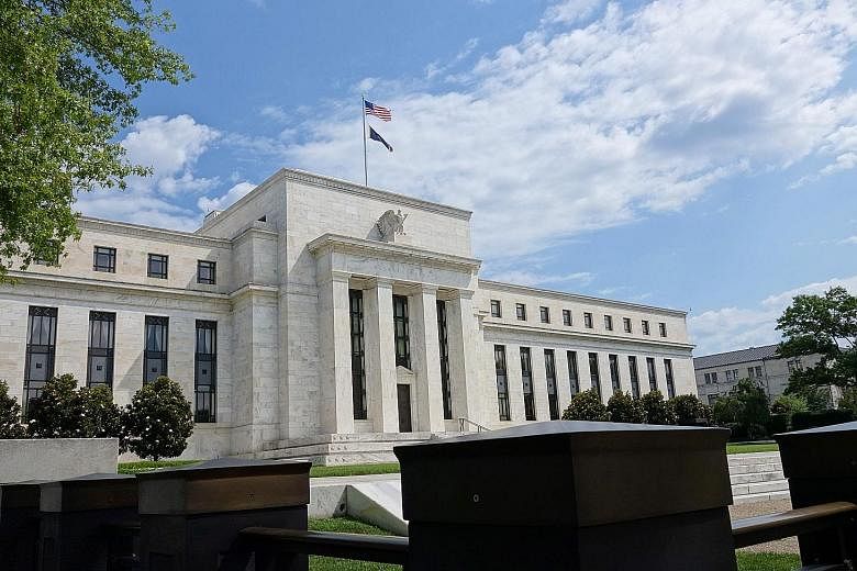 The Federal Reserve building in Washington. Interest rates are likely to stay low with few now expecting the US central bank to hike rates by December, OCBC analyst Andy Wong says.