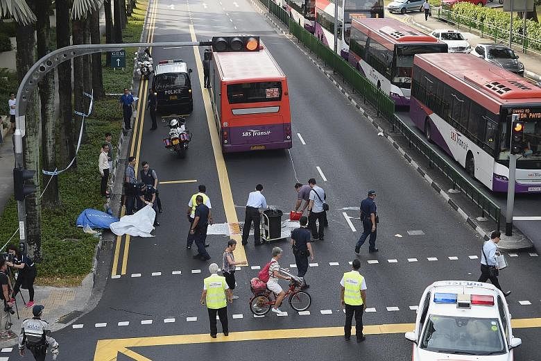 The accident scene being cleared yesterday. A man in his 60s was run over by a bus outside the Toa Payoh interchange early in the morning. Paramedics pronounced him dead at the scene, said SCDF, which was alerted at 6.20am. 