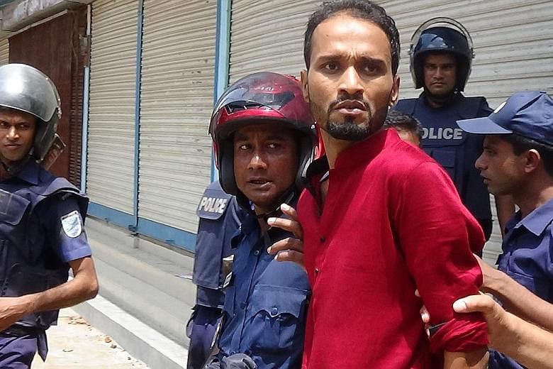 Left: Police officers swinging into action after militants set off bombs near a huge Aidilfitri prayer gathering in Kishoreganj district yesterday. Above: One of the three attackers who were arrested.