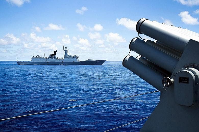 China's South Sea Fleet taking part in a logistics drill near the James Shoal area in the South China Sea in May. The UN-backed Permanent Court of Arbitration will rule next Tuesday in a case the Philippines brought challenging China's claims to most
