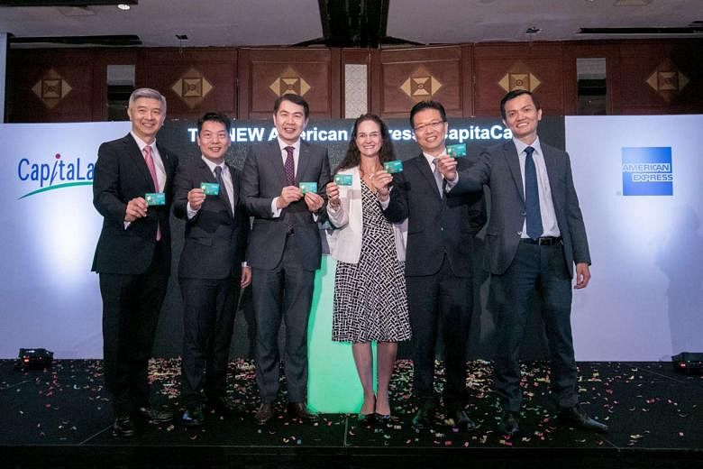 (From left) Mr Wilson Tan, CapitaLand Mall Trust Management CEO; Mr Jason Leow, CapitaLand Mall Asia CEO; Mr Lim Ming Yan, president and group CEO of CapitaLand; Ms Melanie Cochrane, senior vice-president and general manager of Japa, Global Merchant Servi