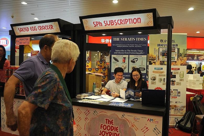 SPH subscription booths set up islandwide offer attractive deals and prizes for ST subscribers.