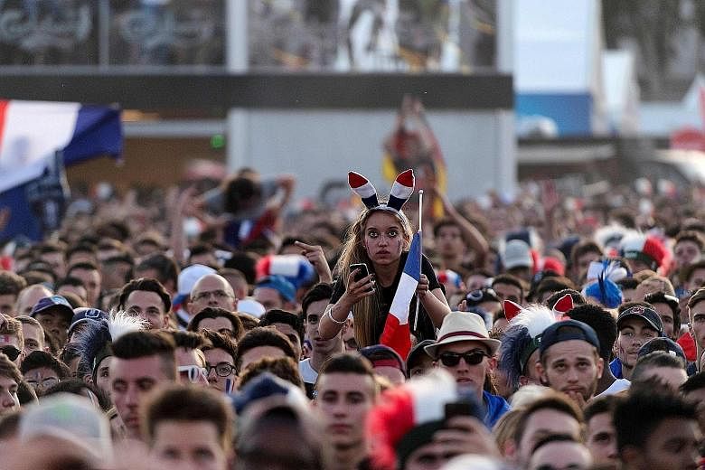 Fans in Lyon watching host nation France put world champions Germany to the sword.