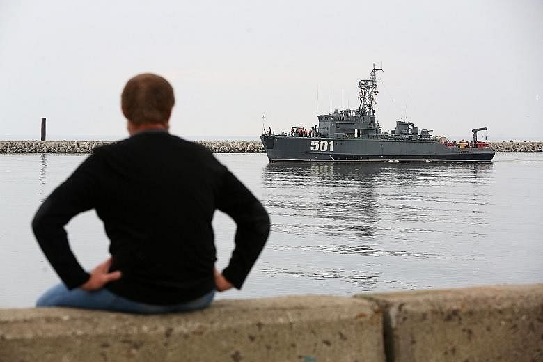 A Sonya-class Russian navy minesweeper sailing past a harbour wall in the Vistula lagoon in Baltiysk, Kaliningrad, recently. Amid Russia's recent rearmament, the Kaliningrad region has increasingly returned to its Soviet-era role as a garrison on the