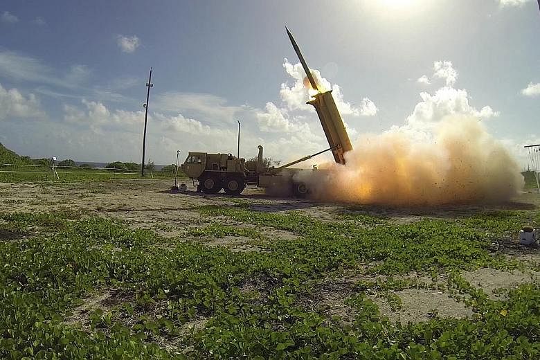 A Thaad interceptor being launched by the US military last year. The announcement of the deployment of the US missile defence system raises the larger strategic question of an arms race in North-east Asia.