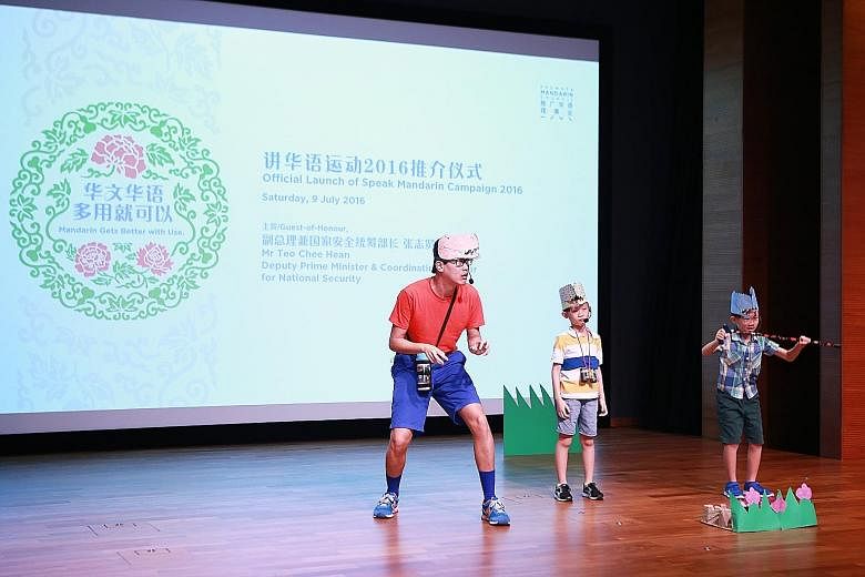 Among previous winners of a talent competition who took the stage yesterday were Mr Chew Kum Lik, 38, an engineering manager, and his two sons Zhen Kai (middle) and Zhen Yuan, both eight.
